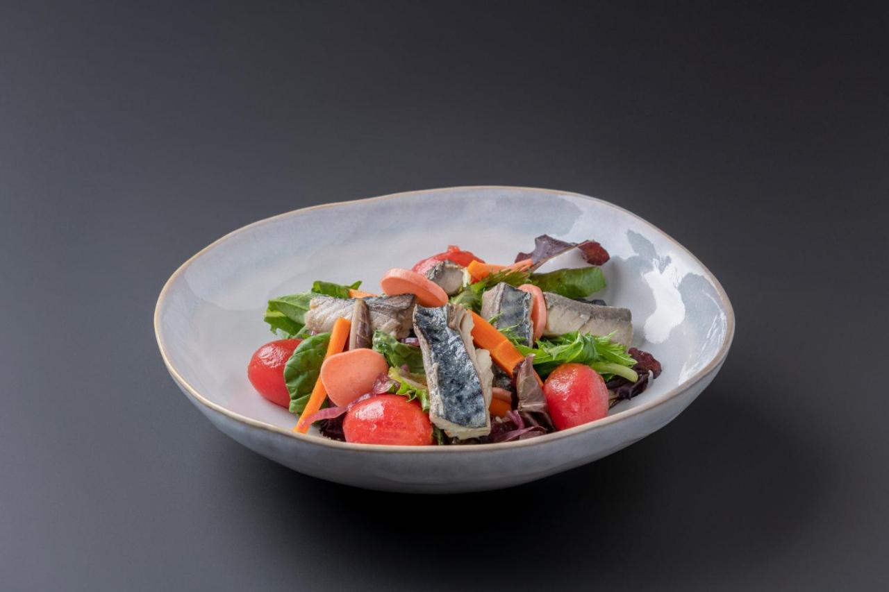 Eurostars Portico Alicante Exteriér fotografie A salad with sardines